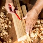 carpenter-measuring-with-ruler-pencil